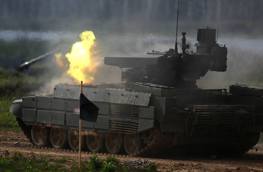 Russia Army Games Tank Biathlon 6632934 25.08.2021 A Terminator-2 tank support combat vehicle BMPT-72 fires during the Tank Biathlon competition at the International Army Games 2021 in Alabino, outsid ...