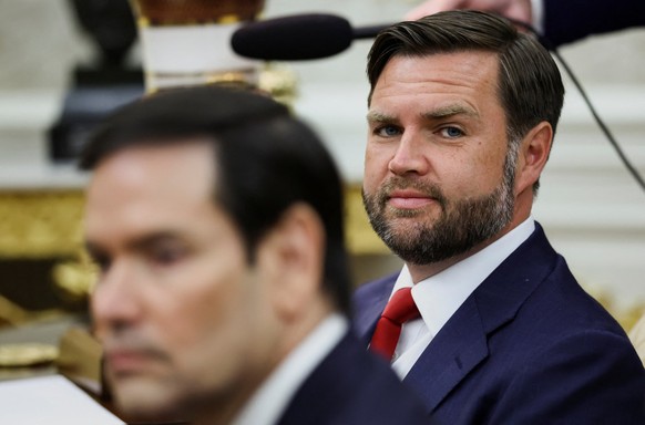 U.S. Vice President JD Vance sits next to Secretary of State Marco Rubio as they attend a meeting between U.S. President Donald Trump and Ukrainian President Volodymyr Zelenskiy at the Oval Office of  ...