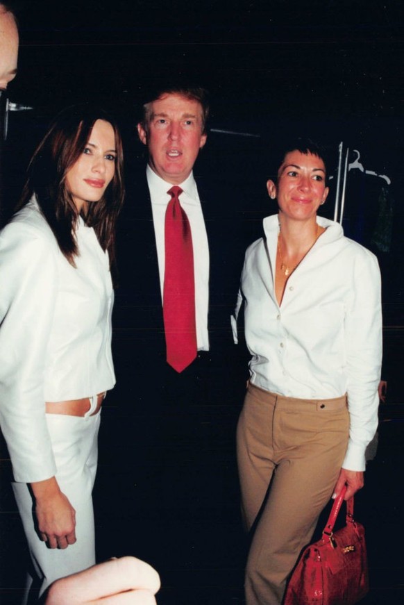 Melania Trump, Donald Trump and Ghislaine Maxwell attend Anand Jon Fashion Show on September 18, 2000 in New York City. (Photo by Rossa W. Cole/Sygma via Getty Images)