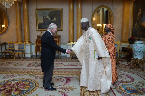 LONDON, UNITED KINGDOM - DECEMBER 13: The Ambassador of Senegal, General Cheikh Wade, presents his credentials to King Charles III during a private audience at Buckingham Palace on December 13, 2023 i ...