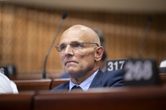 epa11436033 Member of Swiss Delegation to the Parliamentary Assembly of the Council of Europe Alfred Heer, follows the debates in the Palace of Europe, during the third part of the 2024 Ordinary Sessi ...