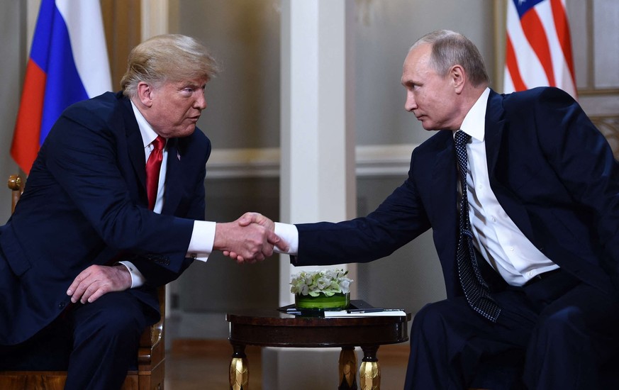 Vladimir Poutine et Donald Trump, lors d&#039;une rencontre à Helsinki le 16 juillet 2018.
