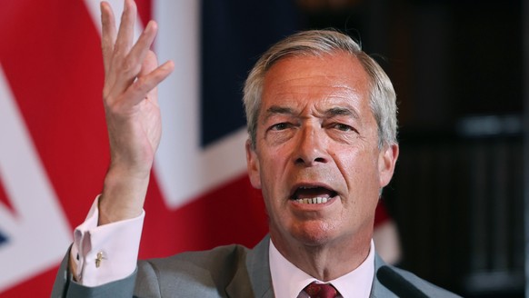 epa13159454 Reform UK leader Nigel Farage speaks during a press conference in London, Britain, 10 August 2026. Farage claimed that if Reform came into power, they would deport every single foreign nat ...
