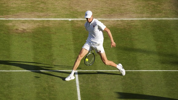Italy&#039;s Jannik Sinner returns to Carlos Alcaraz of Spain in the men&#039;s singles final at the Wimbledon Tennis Championships in London, Sunday, July 13, 2025. (AP Photo/Joanna Chan)
Britain Wim ...