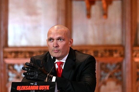 (FILES) Ukraine&#039;s Oleksandr Usyk speaks during a press conference, in central London, on October 23, 2024, ahead of his undisputed heavyweight world championship rematch against Britain&#039;s Ty ...