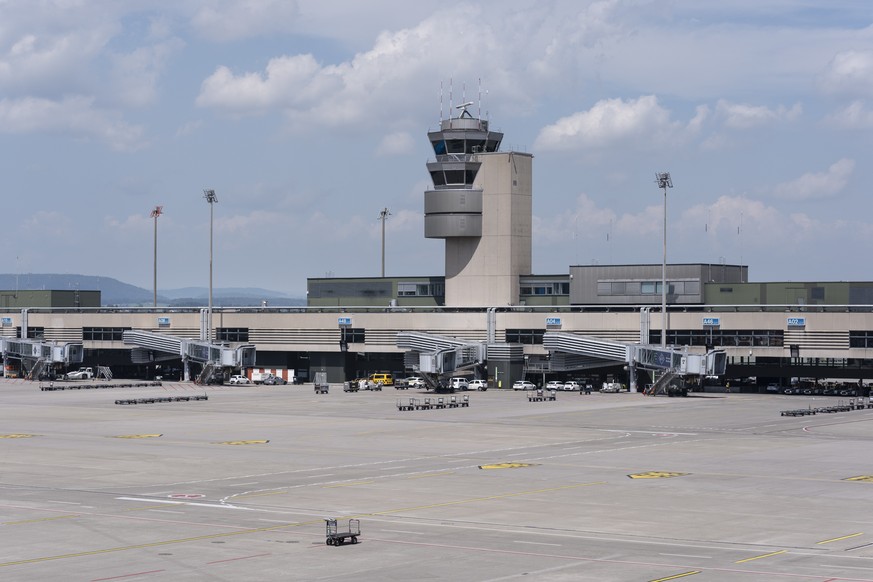A few aircraft wait at the boarding gates on an almost empty tarmac on Friday 19 July 2024 at Zurich airport in Kloten, Switzerland. Due to a worldwide IT breakdown, check-in for air travellers and fl ...