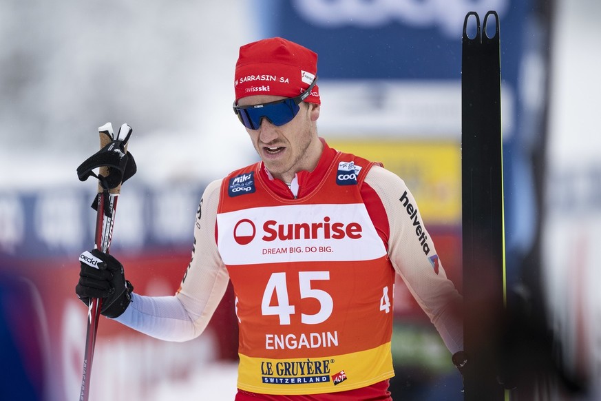 Candide Pralong of Switzerland reacts in the finish area during the men?s 20km mass start free style cross country skiing world cup, on Sunday, January 26, 2025, in Silvaplana, Switzerland. (KEYSTONE/ ...