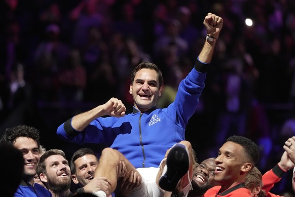 Team Europe&#039;s Roger Federer is lifted by fellow players after playing with Rafael Nadal in a Laver Cup doubles match against Team World&#039;s Jack Sock and Frances Tiafoe at the O2 arena in Lond ...