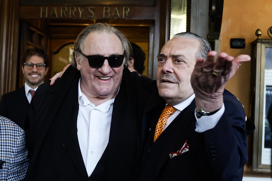 epa12661480 French actor Gerard Depardieu (L) and Italian photographer Rino Barillari (R) speak during their meeting at Harry's Bar in Via Veneto, in Rome, Italy, 19 January 2026. In 2024 the Fre ...