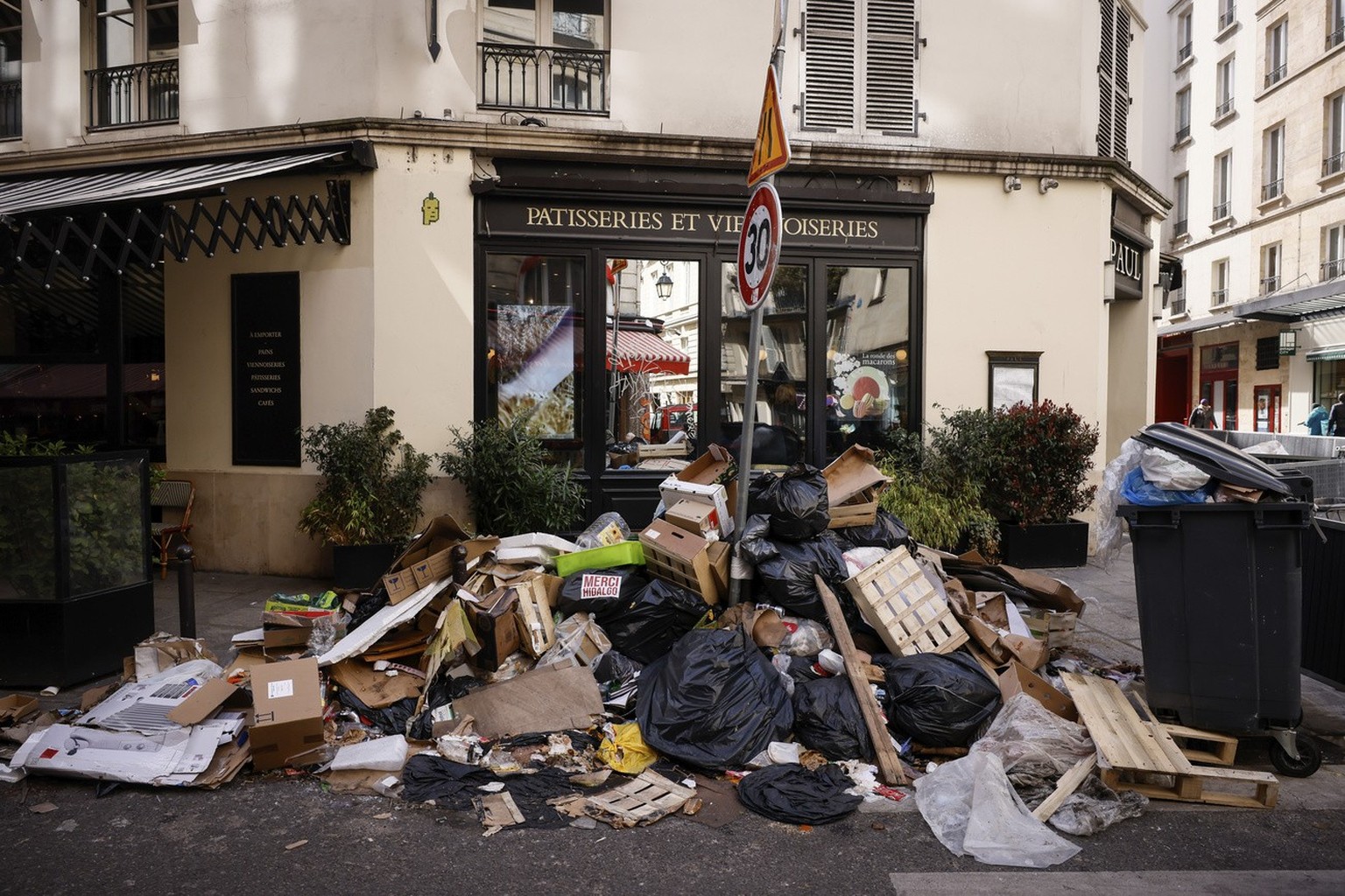 Uncollected garbages are pictured in Paris, Wednesday, March 15, 2023 as sanitation workers are on strike. Opponents of French President Emmanuel Macron&#039;s pension plan are staging a new round of  ...