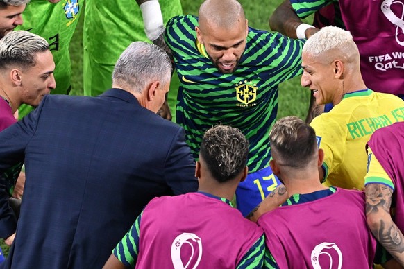 epa10350540 Richarlison of Brazil celebrates scoring the 3-0 goal by dancing with head coach Tite during the FIFA World Cup 2022 round of 16 soccer match between Brazil and South Korea at Stadium 974  ...