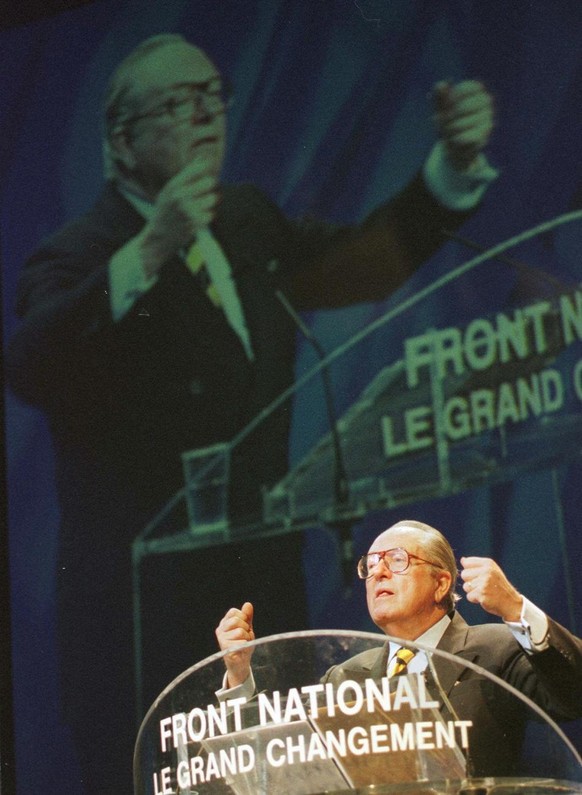 French leader of the far-right National Front Jean Marie Le Pen gestures during the speech he adressed to the 2,200 delegates gathered for the tenth congress of his party in Strasbourg, Sunday March 3 ...