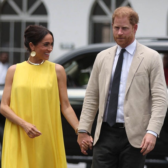 Meghan et Harry lors d'une cérémonie à la maison du gouverneur, à Lagos, le 12 mai.