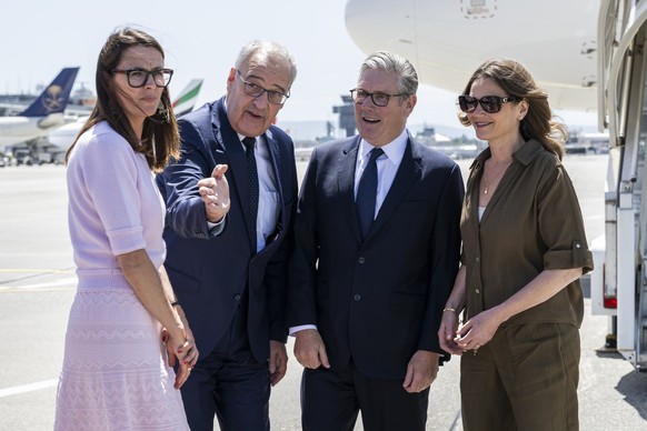 KEYPIX - From left, Anne Hiltpold, President of the Council of State of Geneva, Swiss Federal President Guy Parmelin, welcome Britain's Prime Minister Keir Starmer, and his wife Victoria Starmer, ...