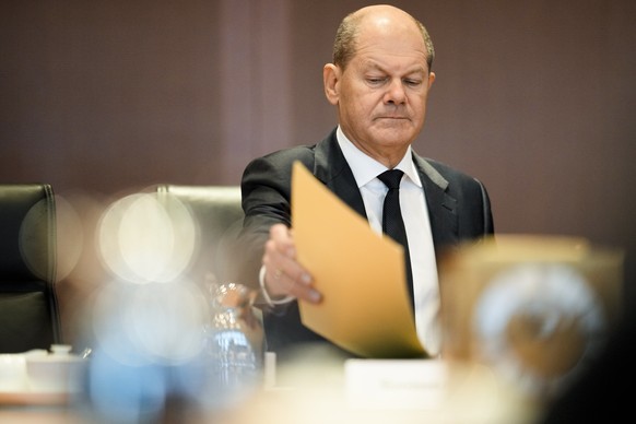 German Chancellor Olaf Scholz attends the weekly cabinet meeting of the German government at the chancellery in Berlin, Germany, Wednesday, Jan. 25, 2023. (AP Photo/Markus Schreiber)