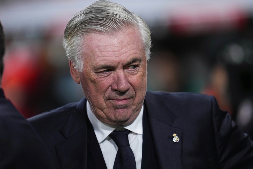 Real Madrid&#039;s head coach Carlo Ancelotti stands next to the bench prior to the Spanish La Liga soccer match between Real Madrid and Athletic Bilbao at the Santiago Bernabeu stadium in Madrid, Sun ...