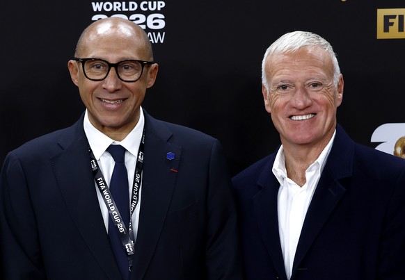 epa12573212 Head coach of the French national soccer team Didier Deschamps (R) and Philippe Diallo, president of the French soccer federation arrive for the FIFA World Cup 2026 Final Draw at the Kenne ...