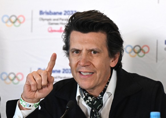 epa12124507 Christophe Dubi, IOC Olympic Games Executive Director speaks to the media as International Olympic Committee Coordination Commission members attend a press conference for the Brisbane 2032 ...