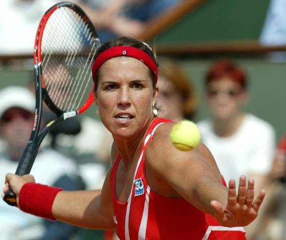 US Jennifer Capriati eyes the ball during the match against Russian Anastasia Myskina in the semi finals of the French Open tennis championships at Roland Garros, Paris, on Thursday, 03 June 2004. Mys ...