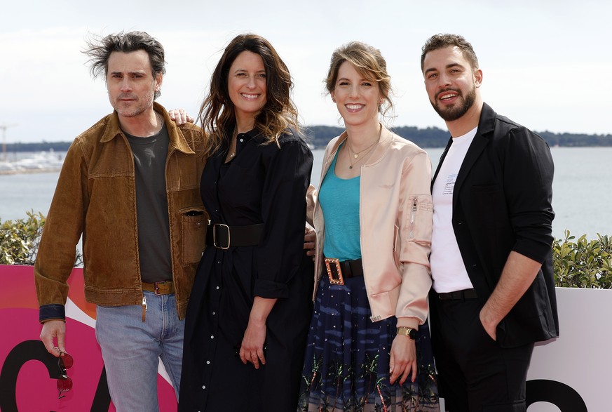 epa09865950 (L-R) French actor Nicolas Berger Vachon, French actress Anne Decis, French actress Lea Francois and French actor Marwan Berreni pose during a photocall for the TV series 'Plus Belle ...