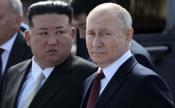 Poutine et Kim Jong Un