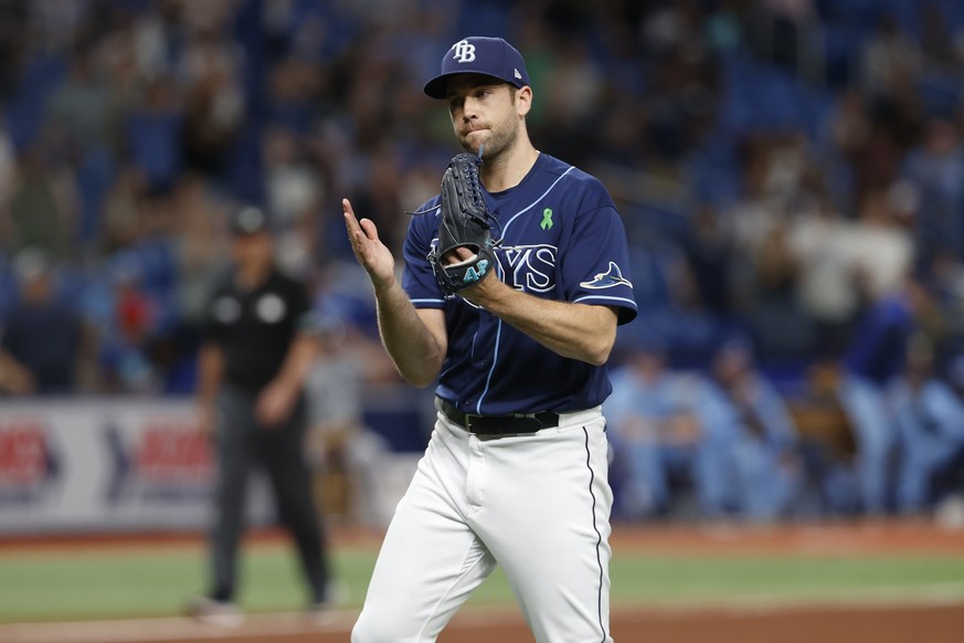 Tampa Bay Rays pitcher Jason Adam reacts after defeating the Toronto Blue Jays in a baseball game Friday, May 13, 2022, in St. Petersburg, Fla. (AP Photo/Scott Audette)