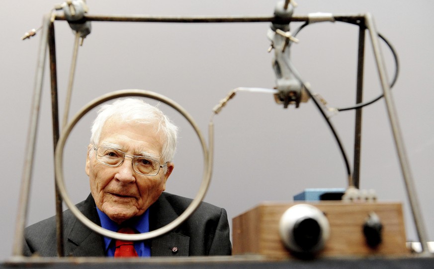 FILE - Scientist and inventor James Lovelock, 94, poses with one of his early inventions, a homemade Gas Chromatography device, used for measuring gas and molecules present in the atmosphere, during a ...