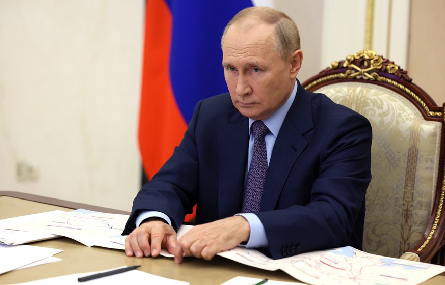 epa10170087 Russian President Vladimir Putin takes part in a ceremony to open new and reconstructed transport network sections in several regions, including the M12 and M5 motorways, as well as the Ye ...