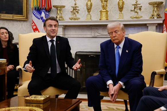 epa11922139 US President Donald Trump (R) meets with French President Emmanuel Macron (L) at the Oval Office of the White House in Washington, DC, USA, 24 February 2025. EPA/LUDOVIC MARIN / POOL