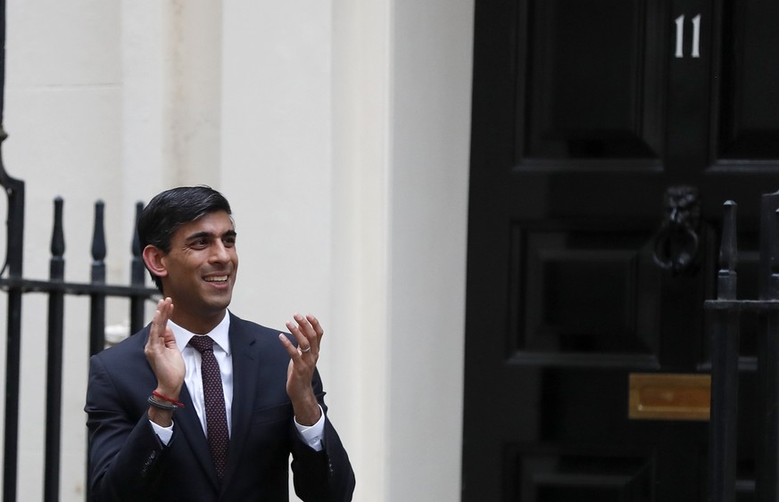 L'ancien prince de Galles, accompagné de l'ex-Chancelier Rishi Sunak, à Londres, en mai dernier.