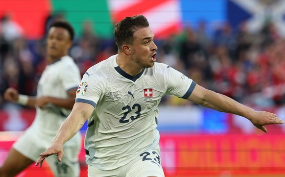 epa11423929 Xherdan Shaqiri of Switzerland celebrates scoring the equalizer during the UEFA EURO 2024 group A soccer match between Scotland and Switzerland, in Cologne, Germany, 19 June 2024. EPA/FRIE ...
