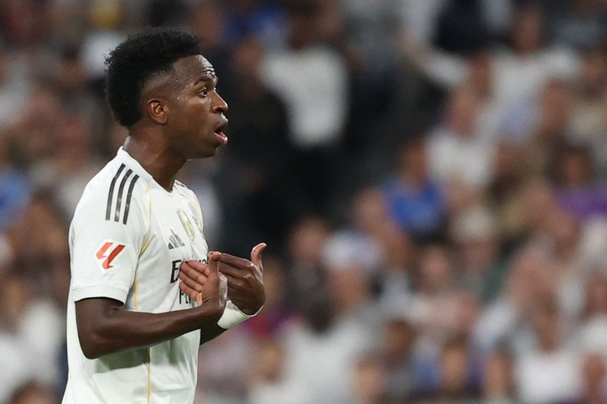 Real Madrid&#039;s Brazilian forward #07 Vinicius Junior reacts to his substitution during the Spanish league football match between Real Madrid CF and FC Barcelona at Santiago Bernabeu Stadium in Mad ...