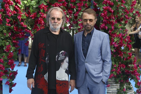 Members of the group ABBA, Benny Andersson, left, and Bjorn Ulvaeus pose for photographers upon arrival at the World premiere of the film &#039;Mamma Mia! Here We Go Again&#039;, in London Monday, Jul ...