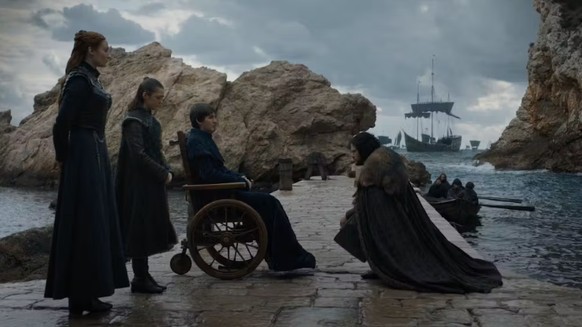 Jon Snow s’agenouille devant Bran.