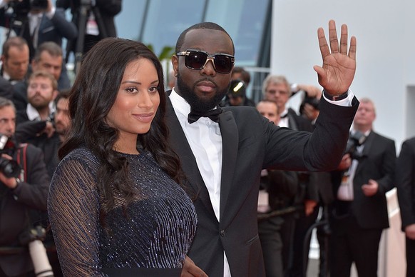 CANNES, FRANCE - MAY 14: Maitre Gims and his wife DemDem attend &quot;The BFG (Le Bon Gros Geant - Le BGG)&quot; premiere during the 69th annual Cannes Film Festival at the Palais des Festivals on May ...