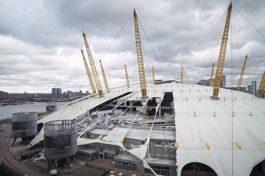 A view of damage to the roof of the O2 Arena, caused by Storm Eunice, in south east London, Friday, Feb. 18, 2022. London Fire Brigade said that there were no reports of any injuries as around 1,000 p ...