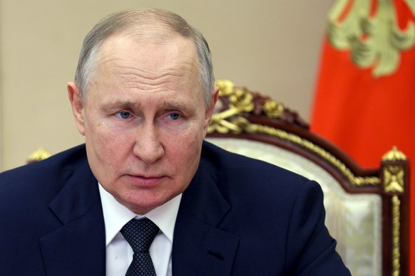 FILE - Russian President Vladimir Putin chairs a Security Council meeting in Moscow, Russia, Friday, March 24, 2023. Russian President Vladimir Putin has announced that he intends to deploy tactical n ...