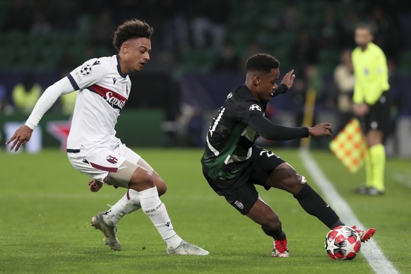 Sporting&#039;s Geny Catamo controls the ball next to Bologna&#039;s Dan Ndoye, left, during the Champions League opening phase soccer match between Sporting CP and Bologna FC at the Alvalade stadium  ...