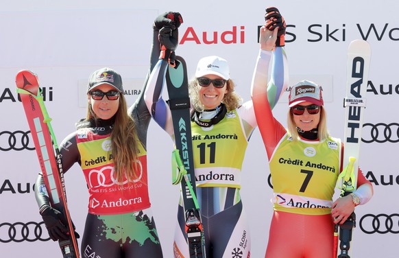 epa10524102 (from L) Second placed Sofia Goggia of Italy, winner Ilka Stuhec of Slovenia and third placed Lara Gut-Behrami of Switzerland during the podium ceremony for the Women&#039;s Downhill race  ...