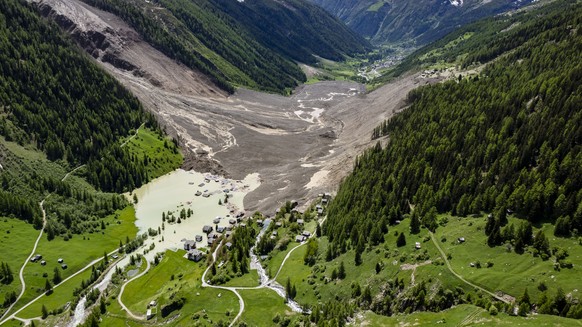 KEYPIX - A aerial view captured one day after a massive avalanche, triggered by the collapse of the Birch Glacier, shows the destruction it caused as it swept down to the valley floor and demolishing  ...