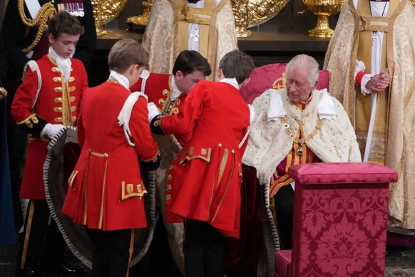 LONDON, ENGLAND - MAY 06: King Charles III with his Pages of Honour during the coronation ceremony of King Charles III and Queen Camilla in Westminster Abbey, on May 6, 2023 in London, England. The Co ...