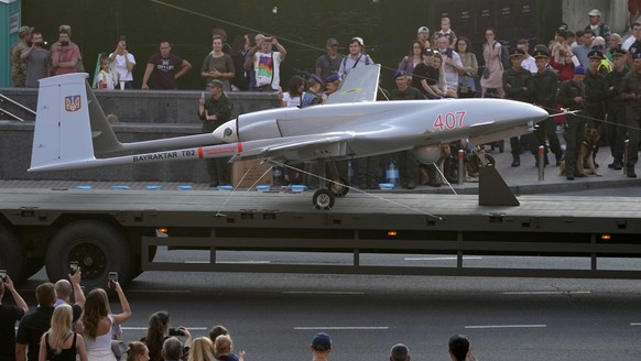 FILE - A Turkish-made Bayraktar TB2 drone is seen during a rehearsal of a military parade dedicated to Independence Day in Kyiv, Ukraine, Friday, Aug. 20, 2021. The Russian invasion of Ukraine is the  ...