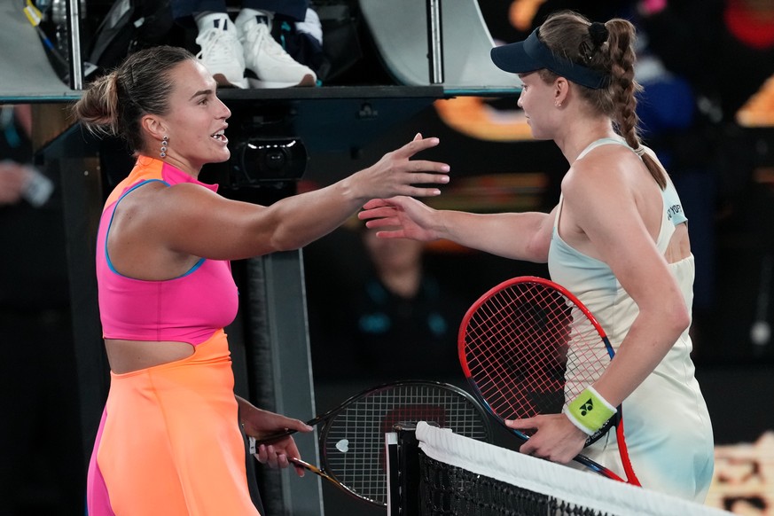 Elena Rybakina, right, of Kazakhstan is congratulated by Aryna Sabalenka, left, of Belarus after winning the women's singles final at the Australian Open tennis championship in Melbourne, Austral ...