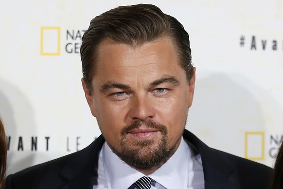 Actor Leonardo Di Caprio poses for photographers during a photo call for the french premiere of the film &amp;#039;Before the Flood&amp;#039;, (&amp;#039;Avant Le Deluge&amp;#039;) at Chatelet Theater ...
