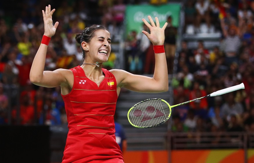 RIO DE JANEIRO, BRAZIL - AUGUST 19: Carolina Marin of Spain celebrates match point against V. Sindhu Pusarla of India during the Women&#039;s Singles Gold Medal Match on Day 14 of the Rio 2016 Olympic ...