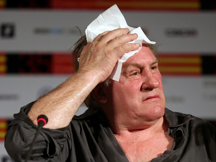 epa03765883 French actor Gerard Depardieu gestures during a press conference for the movie &#039;Rasputin&#039; at the 35th annual Moscow International Film Festival in Moscow, Russia, 29 June 2013. T ...