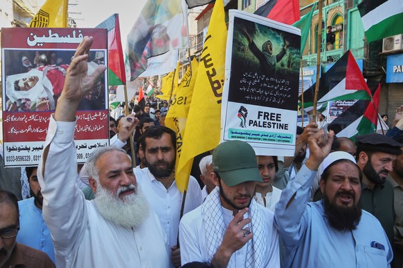 Demonstrators chat slogans during the annual Al-Quds, or Jerusalem, Day rally to show the importance of Jerusalem to Muslims and show solidarity with Palestinian people living in Gaza, in Peshawar, Pa ...