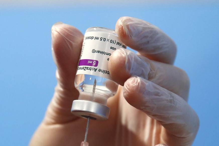 A health worker prepares a dose of the AstraZeneca vaccine to be administered at a vaccination center set up in Fiumicino, near Rome&#039;s international airport, Thursday, Feb. 11, 2021. AstraZeneca  ...