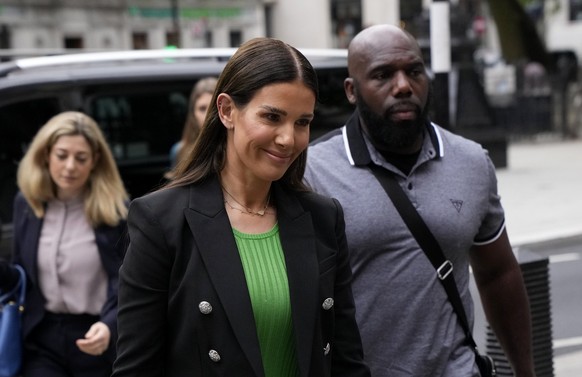 Rebekah Vardy the wife of England soccer player Jamie Vardy arrives at the High Court, in London, Thursday, May 19, 2022. A trial involving a social media dispute between two soccer spouses has been t ...