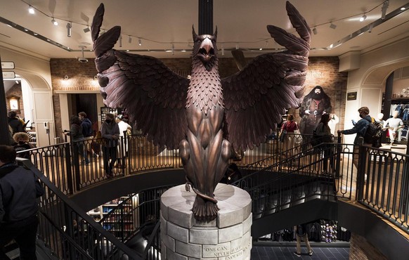 epa09246040 People visit the new Harry Potter flagship store in New York, New York, USA, 03 June 2021. The store, which opened on 03 June, is the largest collection of Harry Potter themed merchandise  ...